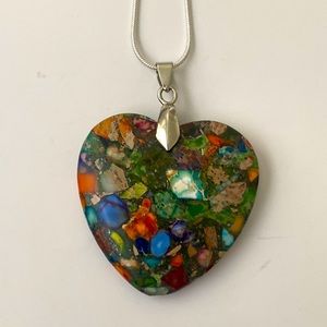Heart shaped rainbow sea sediment Jasper Pendant on a silver chain
